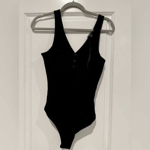 Lulu’s Black Ribbed Knit Sleeveless Bodysuit. Brand new with tags. - Picture 7 of 7